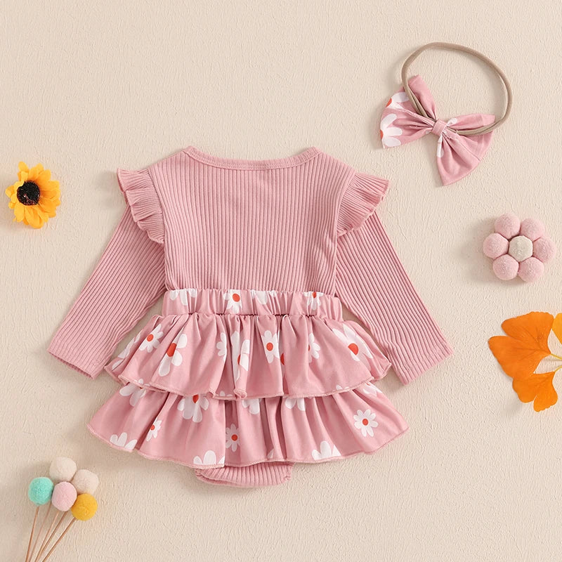 Mama's Girl Ruffle Set in pink, featuring shoulder ruffles and a floral tiered skirt, complete with matching headband.