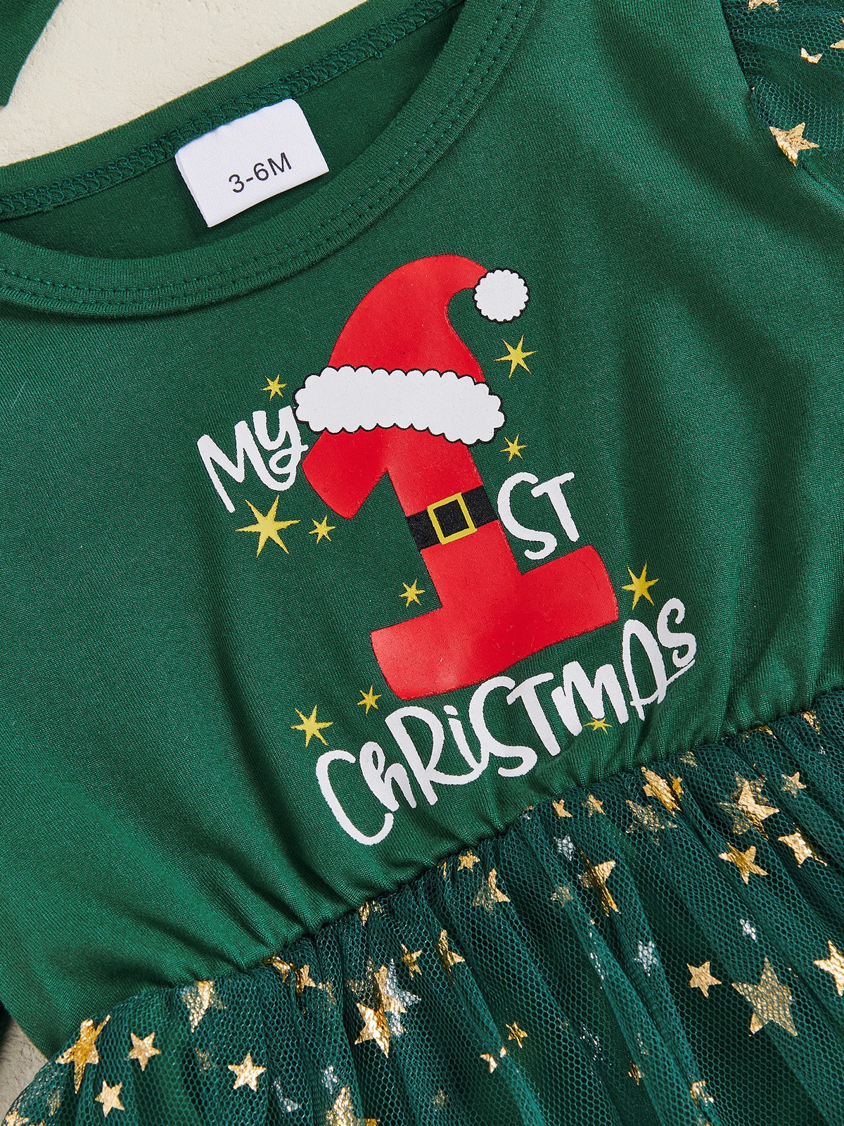 My 1st Christmas Star Tutu Dress for baby girls, festive green with Santa hat print and glittery star tutu, perfect first Christmas outfit.