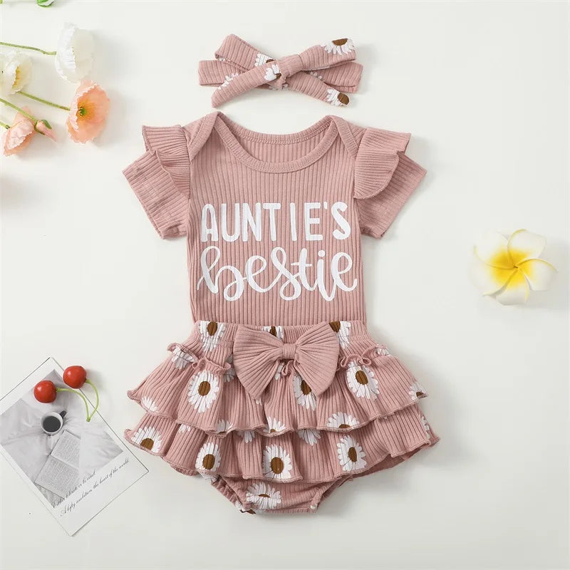 Auntie's Bestie baby girl outfit in pink - with ribbed ruffle romper, ruffle daisy bloomer skirt & matching headband