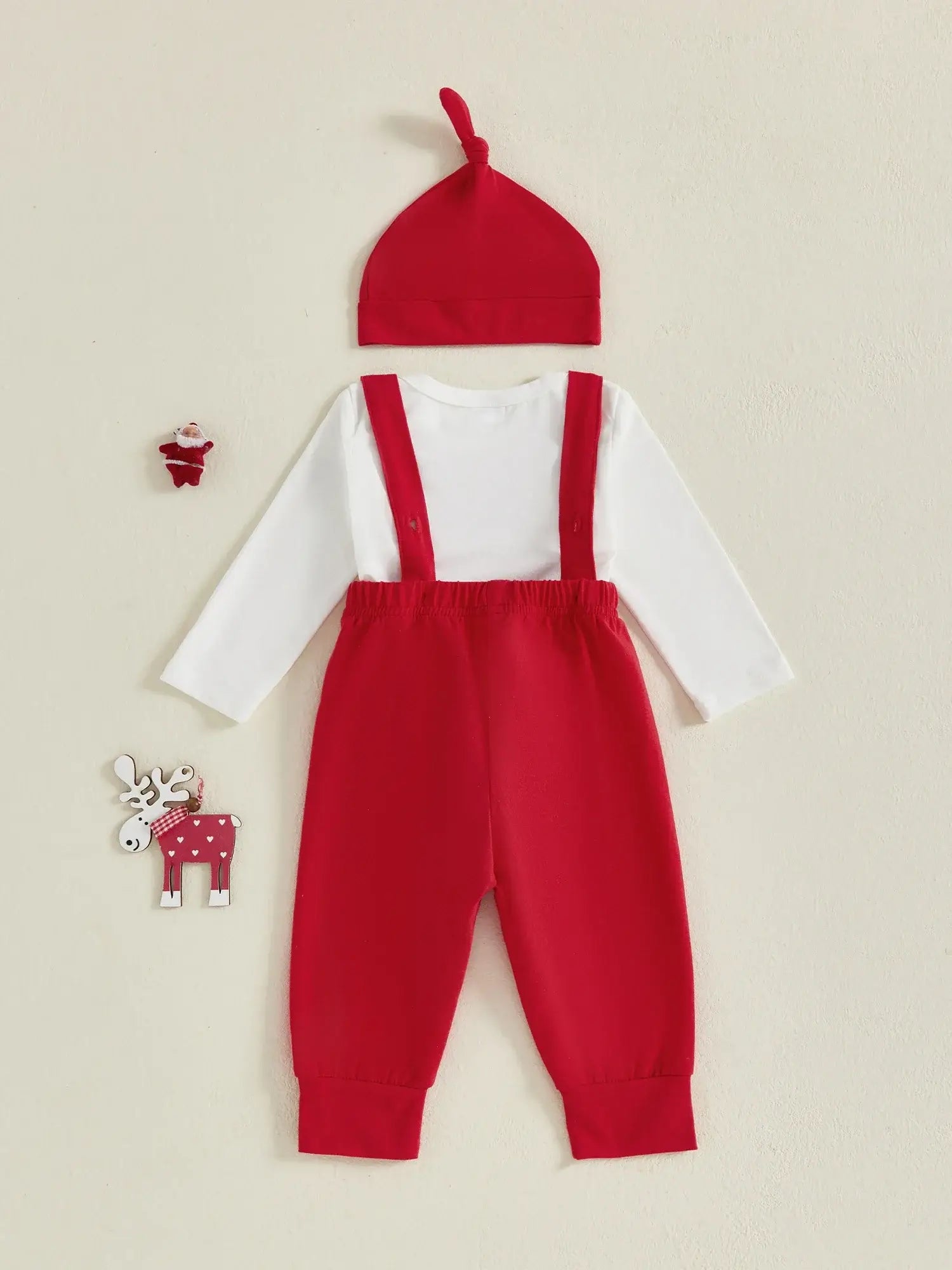 My 1st Christmas suspender set for baby boys with red overalls and matching beanie, perfect festive outfit.