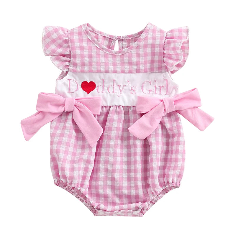 Pink gingham romper for girls with flutter sleeves and ‘D❤️ddy’s Girl’ embroidery and oversized bows.