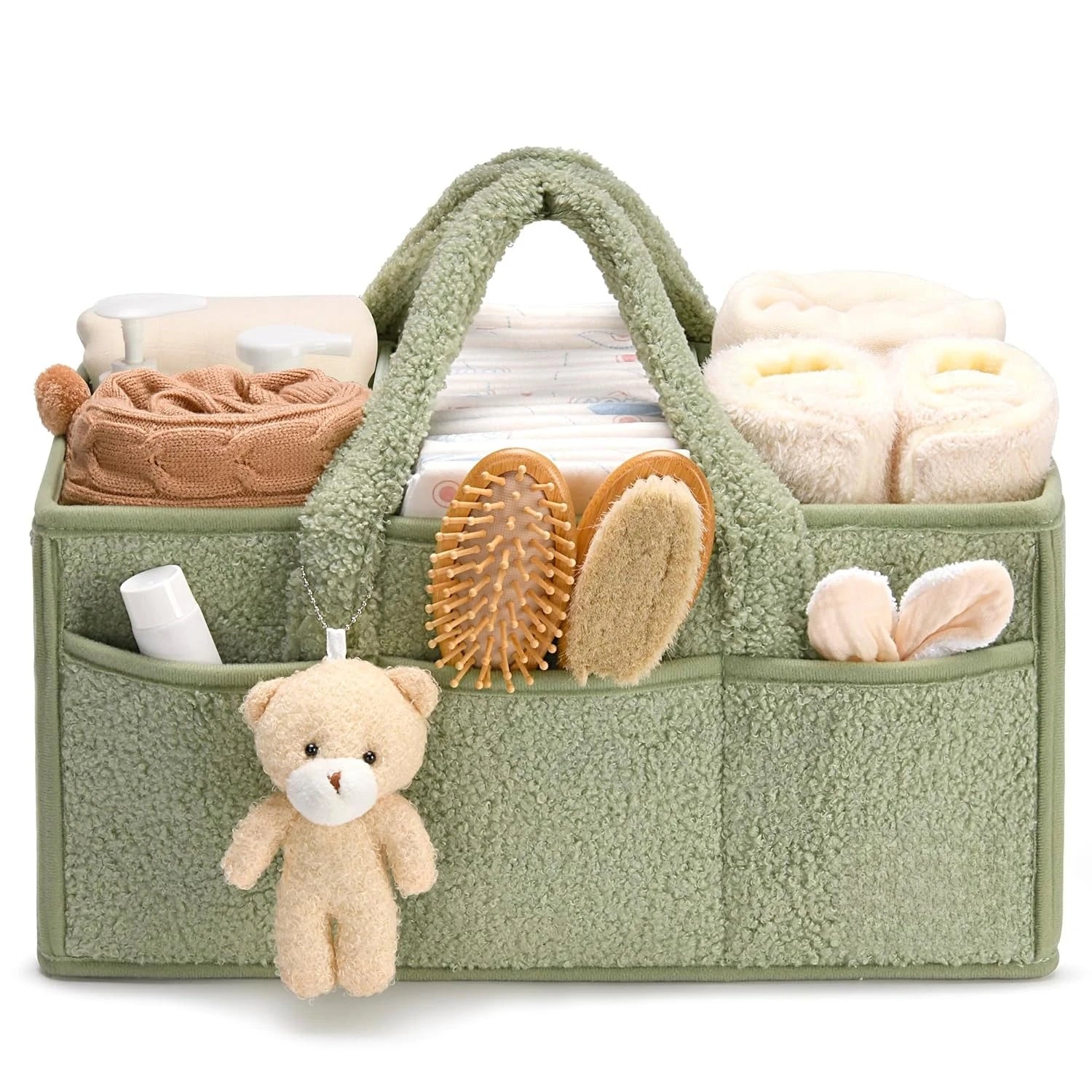 Plush Nappy Caddy in green with baby essentials, including diapers, wipes, and plush toys.