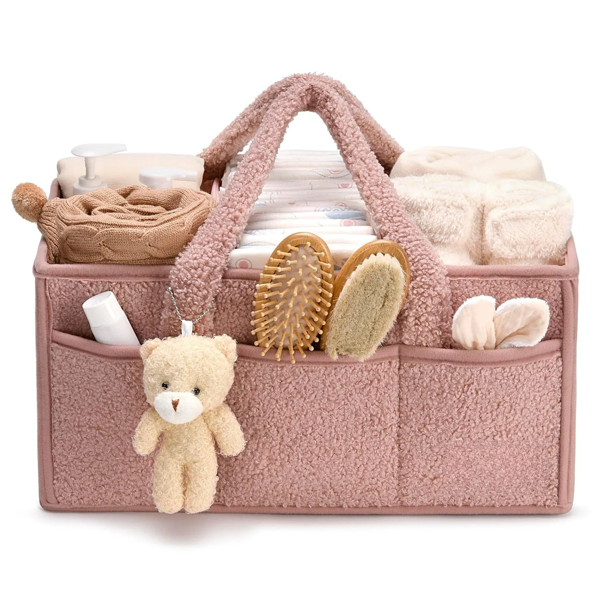 Plush Pink Nappy Caddy filled with baby essentials, featuring soft fabric and organised compartments for nursery clutter-free storage.
