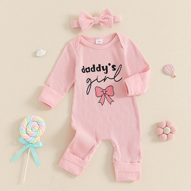 Pink ribbed baby onesie with "daddy's girl" print and bow graphic, and matching bow headband