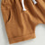 Light brown elasticated shorts with pockets and drawstring for kids, part of the Chicken Nugs & Mama Hugs set.