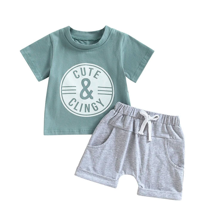 Funny baby boy outfit - "Cute & Clingy" Slogan T-shirt in blue, and grey shorts