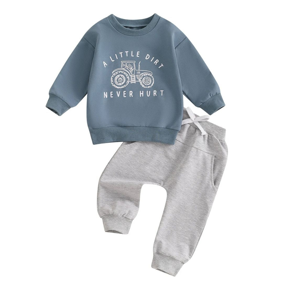 A Little Dirt Never Hurt baby outfit in blue with a tractor graphic pullover and grey tracksuit pants