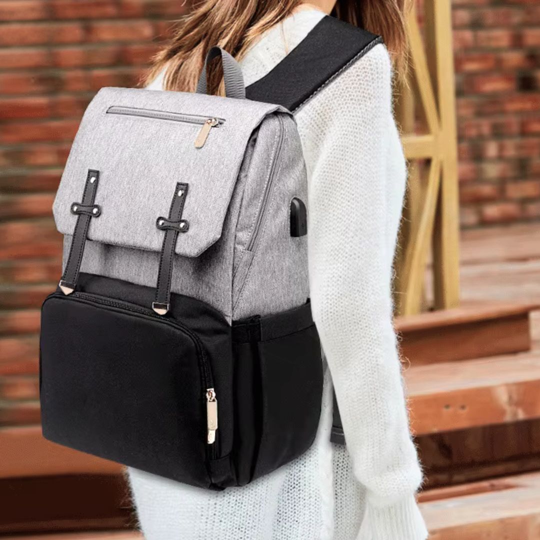 Lifestyle photo of the Amalfi Nappy Backpack from Lulu Babe in grey and black