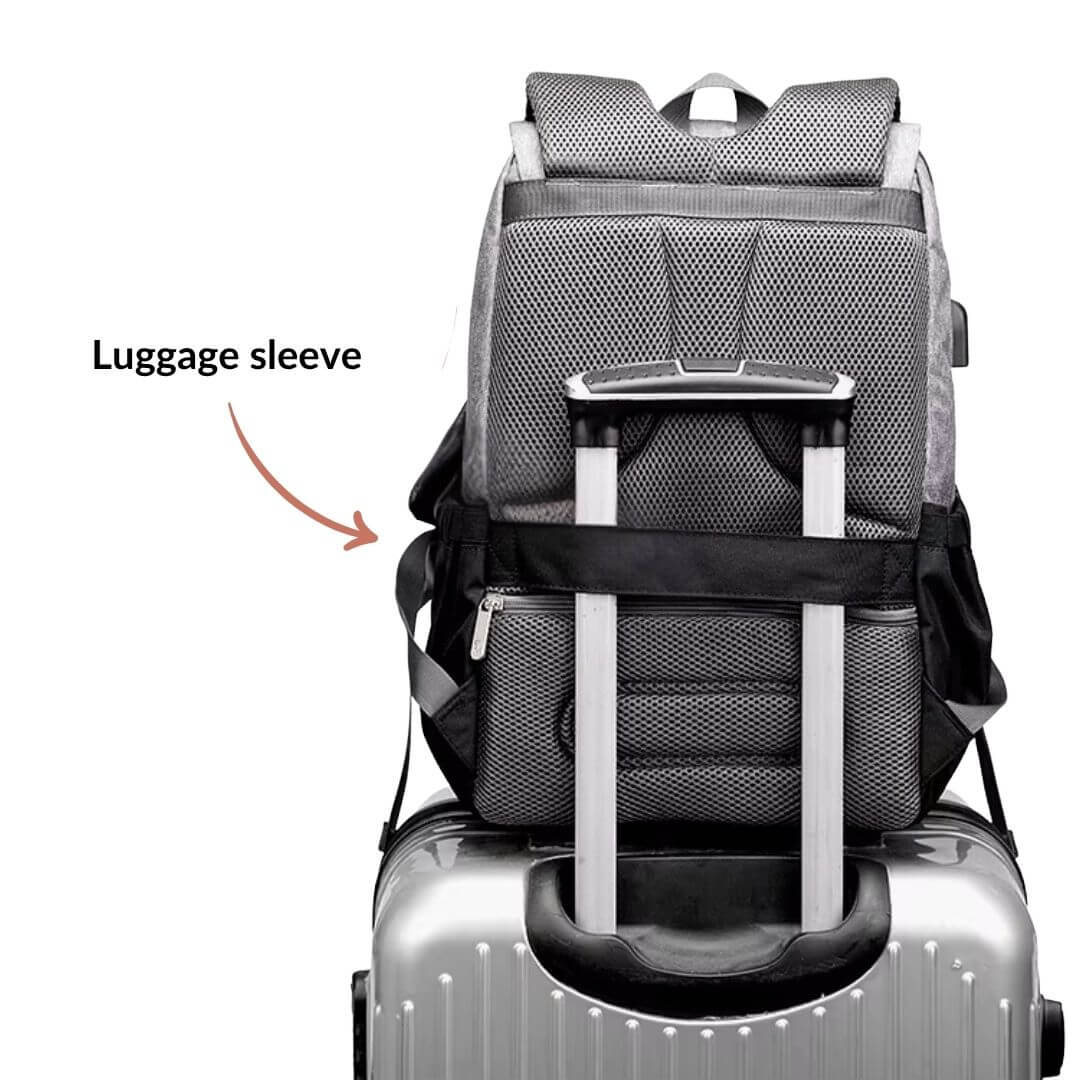 Amalfi Nappy Backpack with luggage sleeve on suitcase for easy travel convenience.