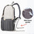 Side view of nappy backpack showing easy-access wipes pocket