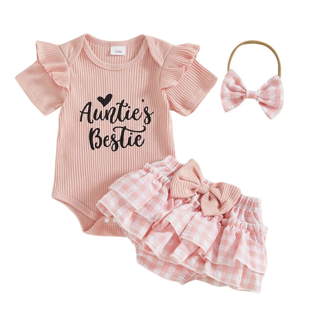 Auntie's Bestie Ruffle Set for baby girls in pink, featuring ribbed bodysuit, gingham shorts, and matching hair bow.