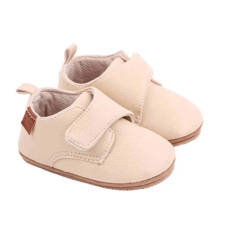 Avery cream vegan leather baby shoes for pre-walkers, featuring a flexible rubber sole