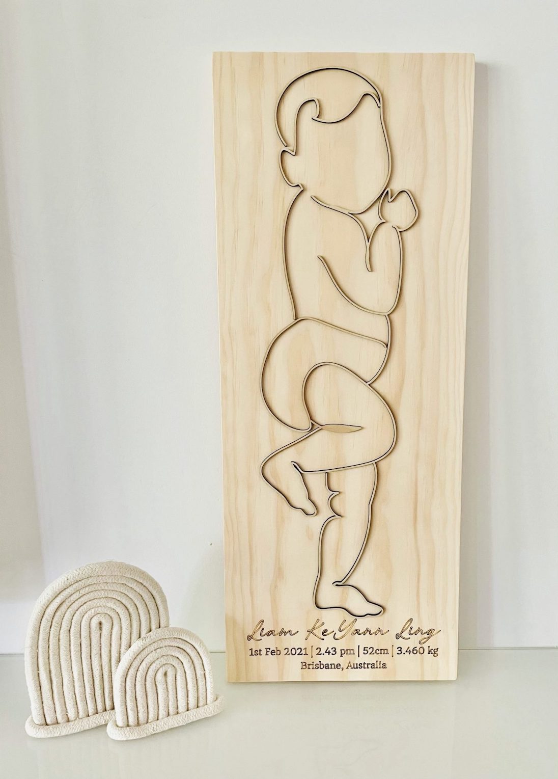 Personalised 3D baby outline birth plaque featuring custom birth details in wood.