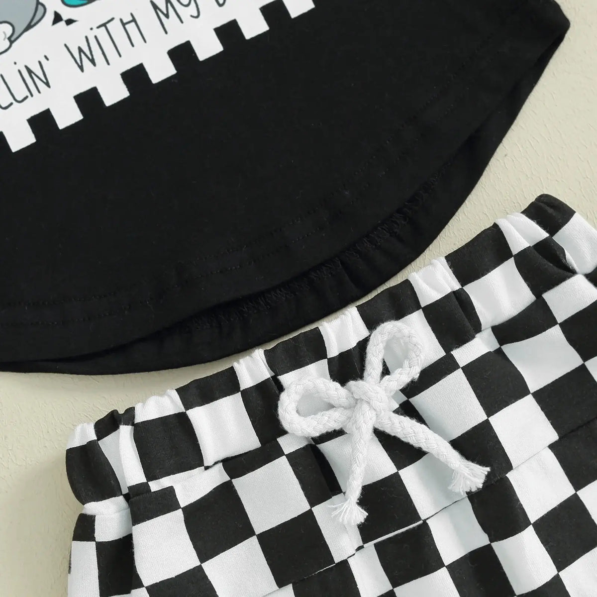 Close-up of Checkerboard Bunny Shorts baby boy outfit