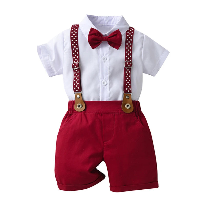 Dapper baby boy formal outfit set with white shirt, red bow tie, red shorts and suspenders