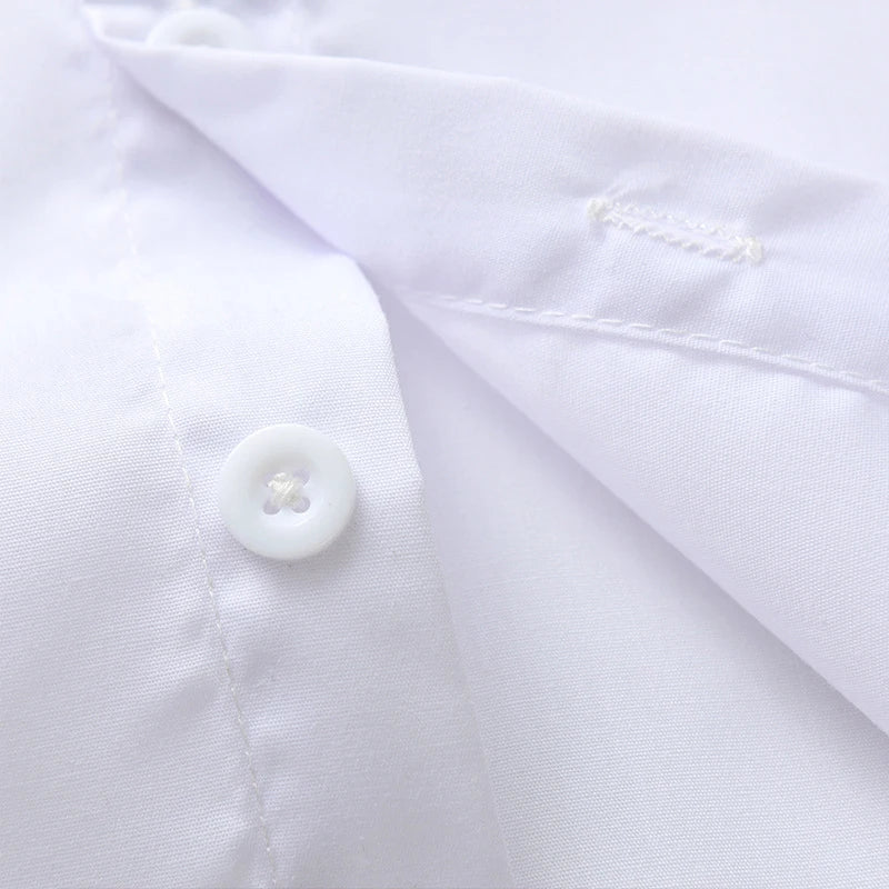 Crisp white shirt detail from the Dapper Red Suspenders Set for boys