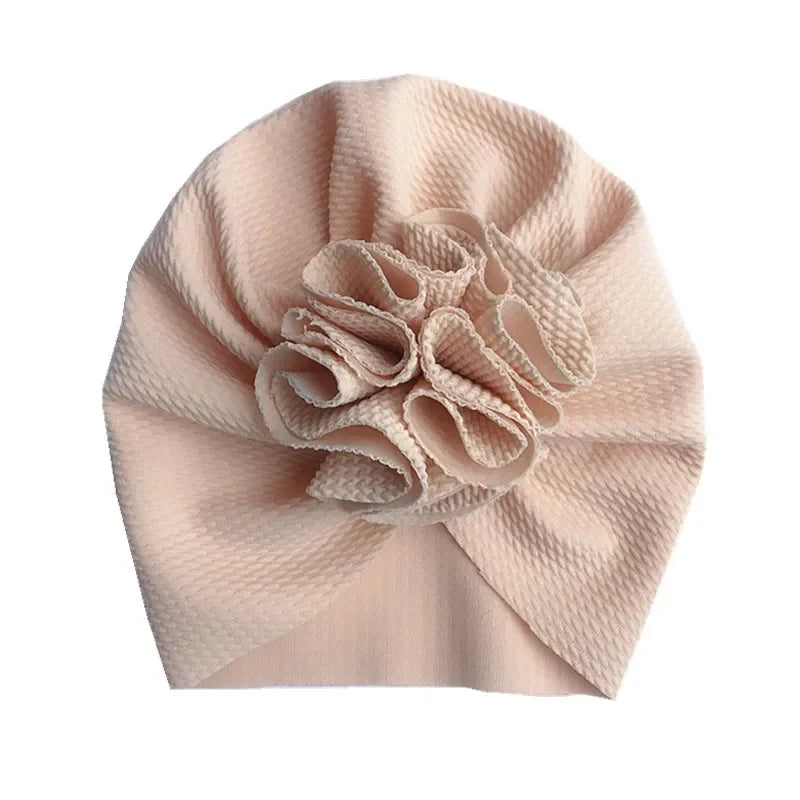 Beige baby girl turban with statement ruffle flower
