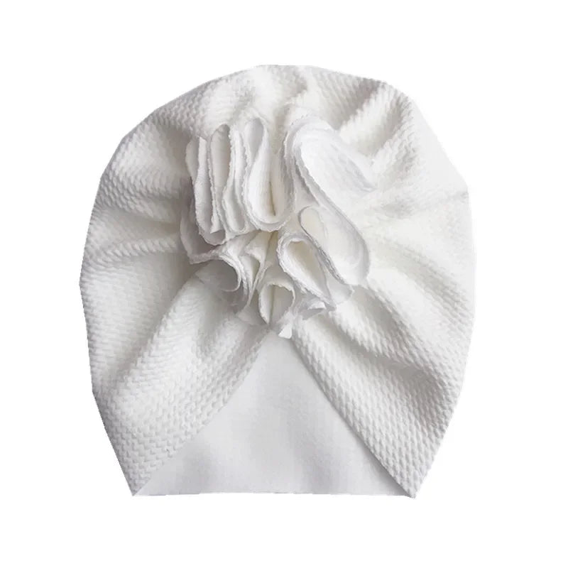 White baby girl turban with statement ruffle flower
