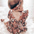 Baby girl outfit with matching headband - adorable floral ruffle onesie in rose pink.