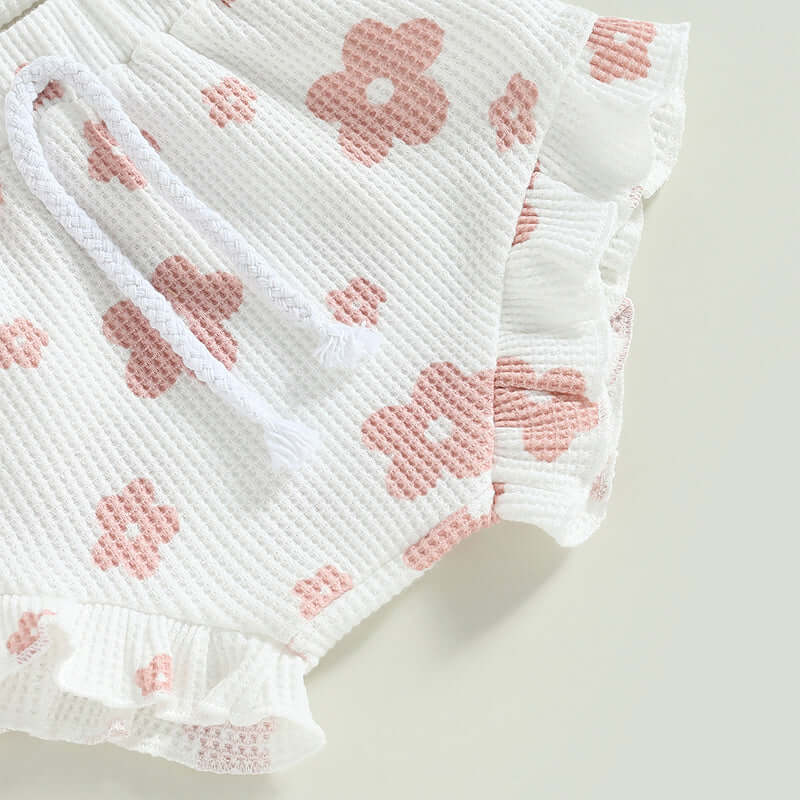Closeup of Genevieve Waffle Romper Set in white with waffle fabric
