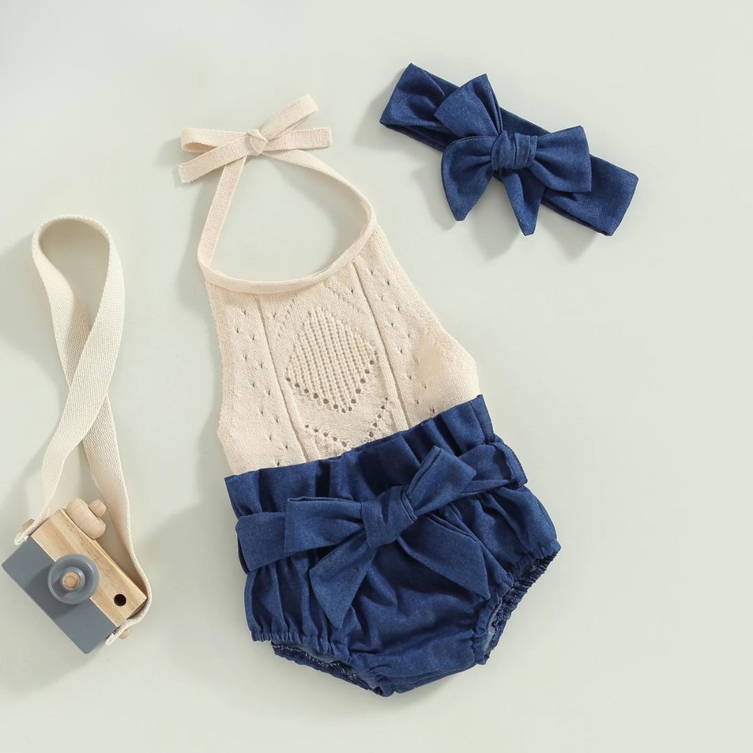 Scarlett baby girl outfit with beige knit halter top and denim bloomer shorts styled flat lay