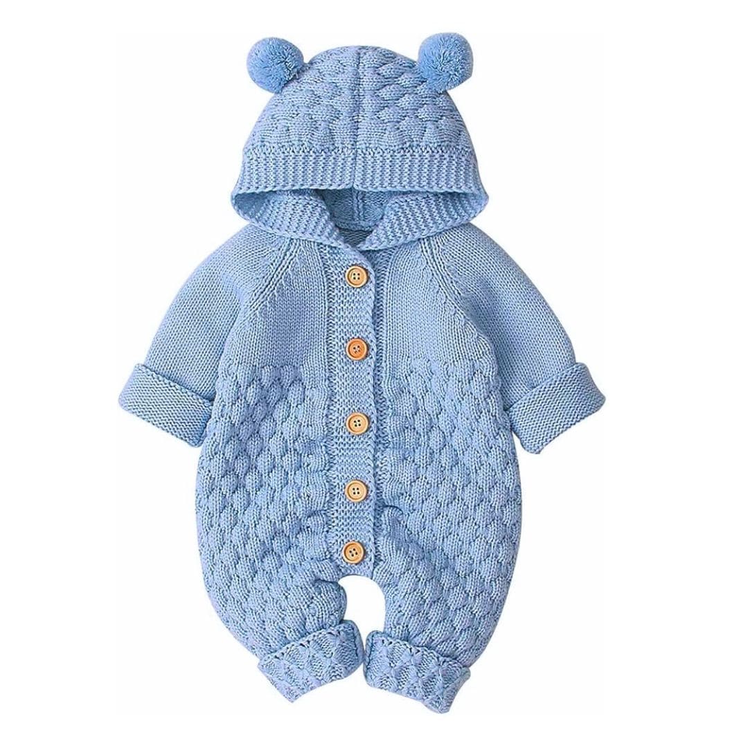 Blue knitted baby romper with hood and pom-pom ears