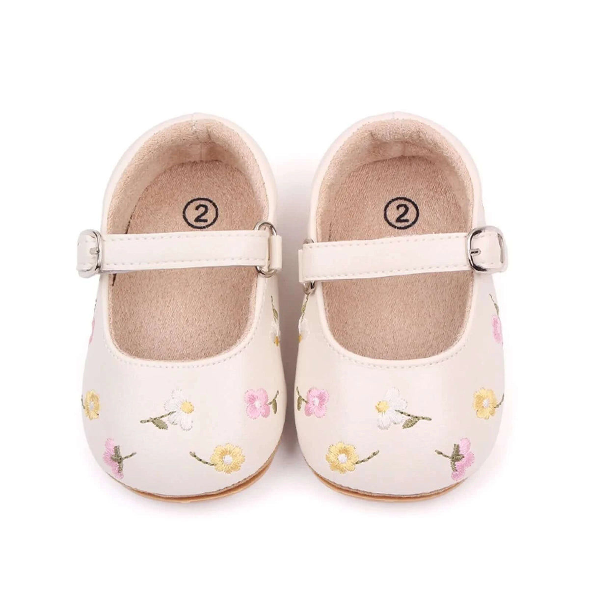 Cream baby Mary Jane shoes with embroidered floral pattern and faux buckle strap