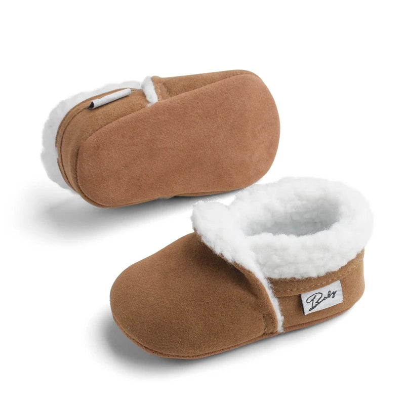 Brown fluffy baby moccasins with non-slip soles