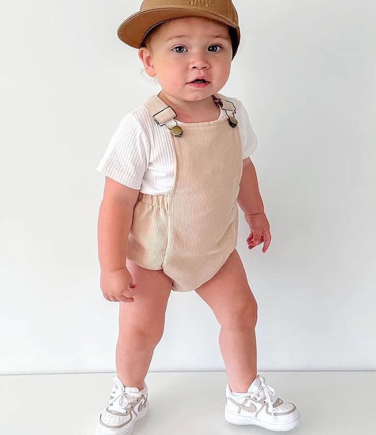 Baby boy wearing Taylor Corduroy Baby Romper Set in beige