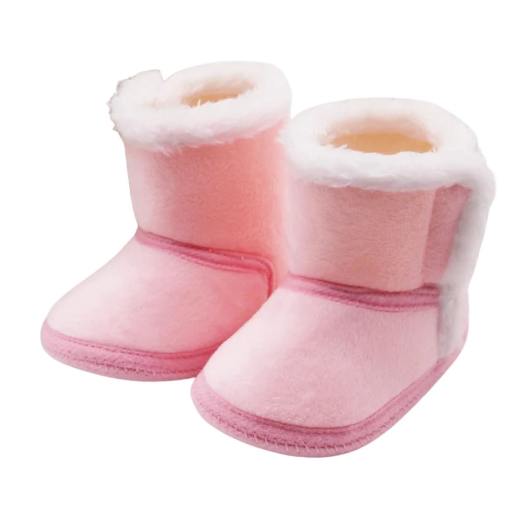 Pink baby slipper boots with fluffy lining, perfect for warmth and comfort for pre-walkers in winter.