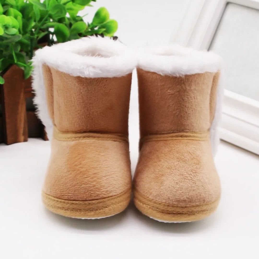 Tan baby slipper boots with fluffy lining, perfect winter baby booties for warmth and comfort. Ideal for pre-walkers.