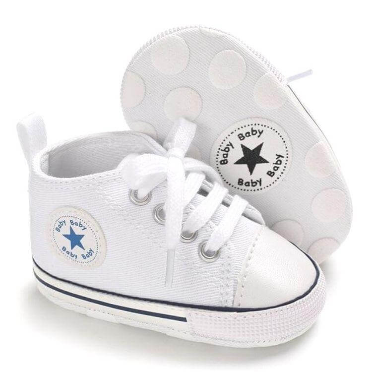 White baby sneakers with star logo