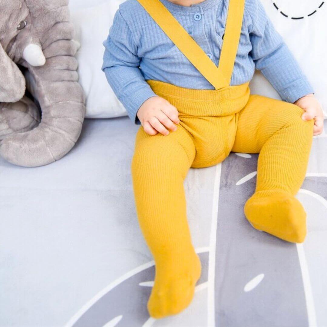 Baby wearing yellow ribbed suspender tights - Lulu Babe