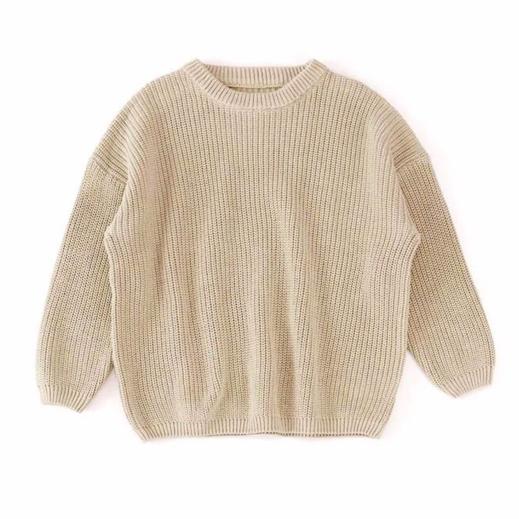 Baby beige knit jumper with ribbed cuffs and oversized style