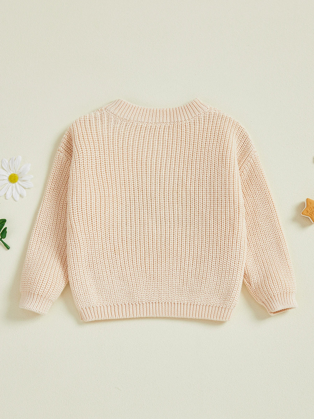 Back view of toddler tractor knit jumper