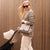 Babymel Quilted Eco Pram Bag - Fawn | Stroller Organiser - lifestyle image