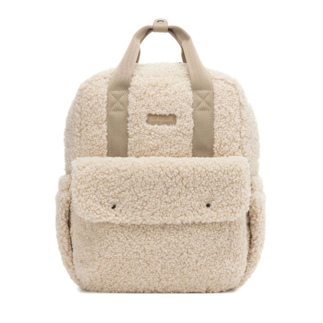 Babymel Teddy Cream Nappy Backpack made from soft cream teddy fleece, stylish with practical design features.