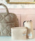 Babymel Willow quilted nappy bag tote in oat, with accessories