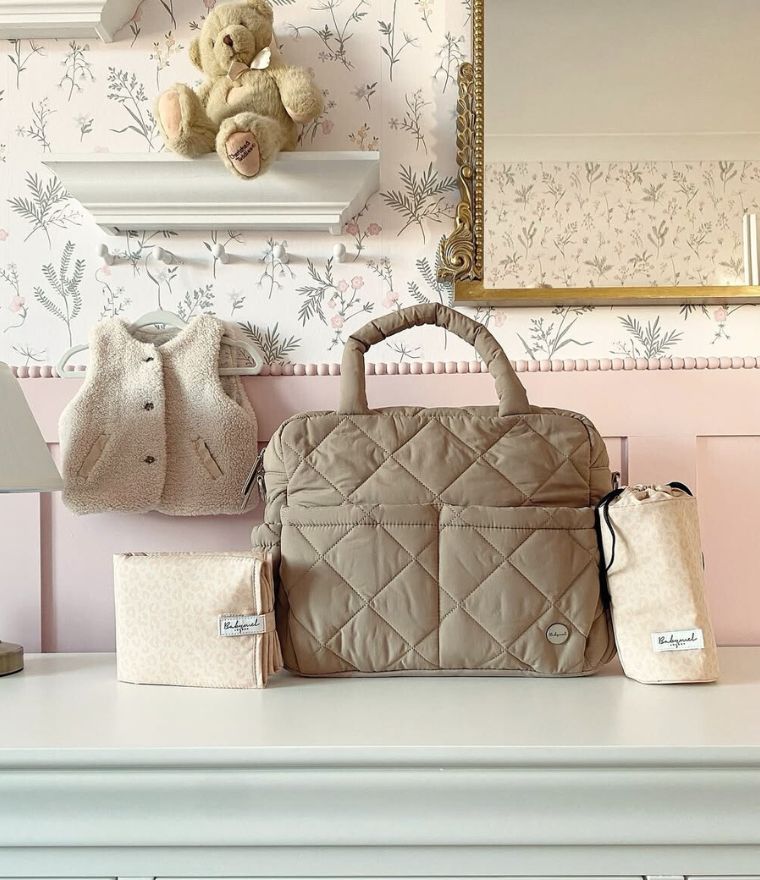 Babymel Willow quilted nappy bag tote in oat, in baby nursery