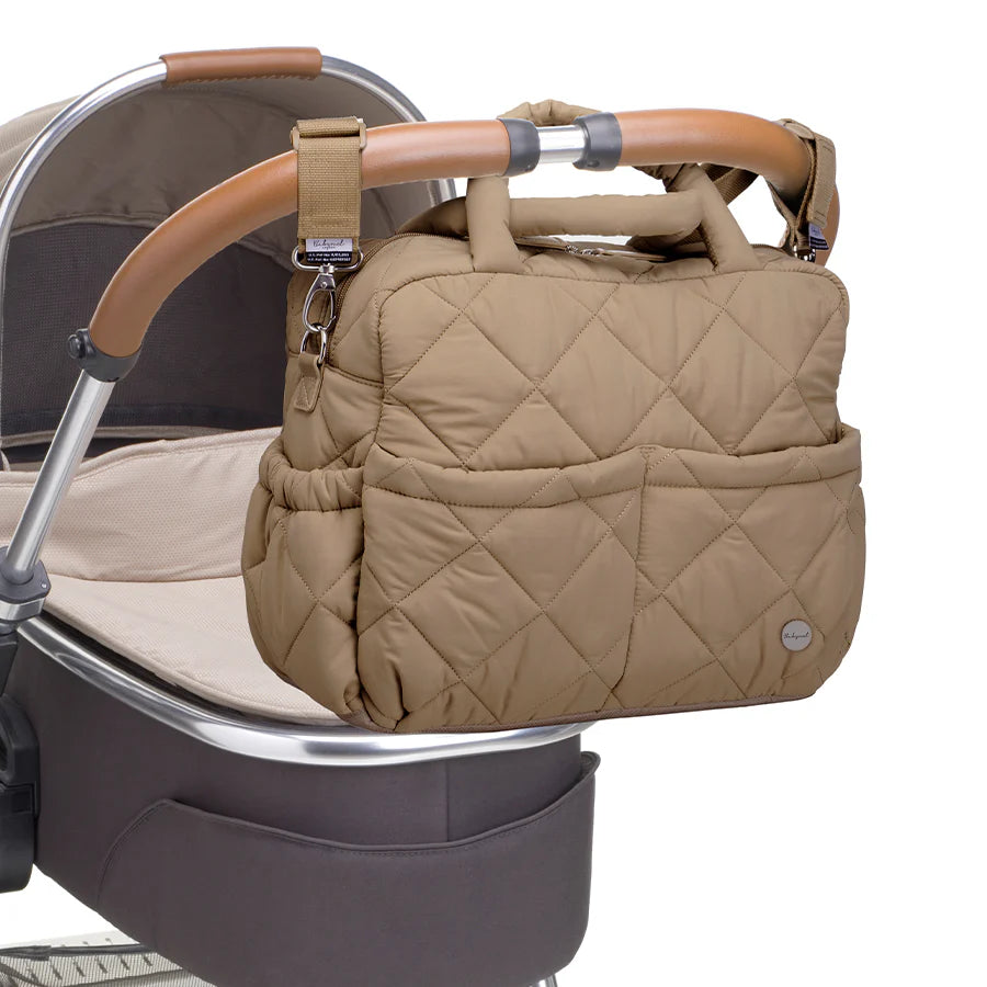 Babymel Willow Nappy Bag in oat - attached to a pram