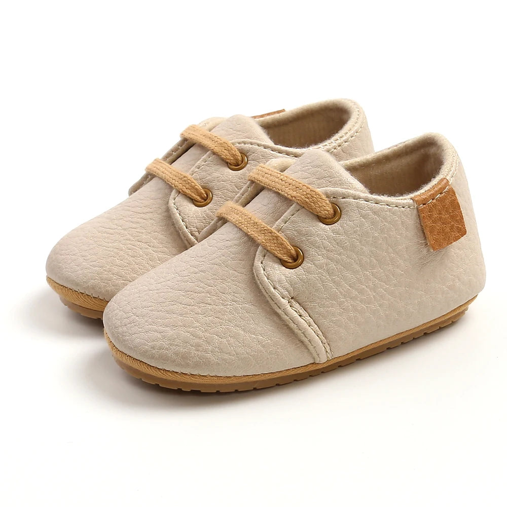 Beige lace-up oxford style baby shoes