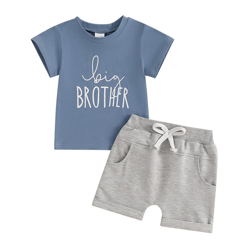 Big brother outfit incldues dusty blue t-shirt and grey shorts