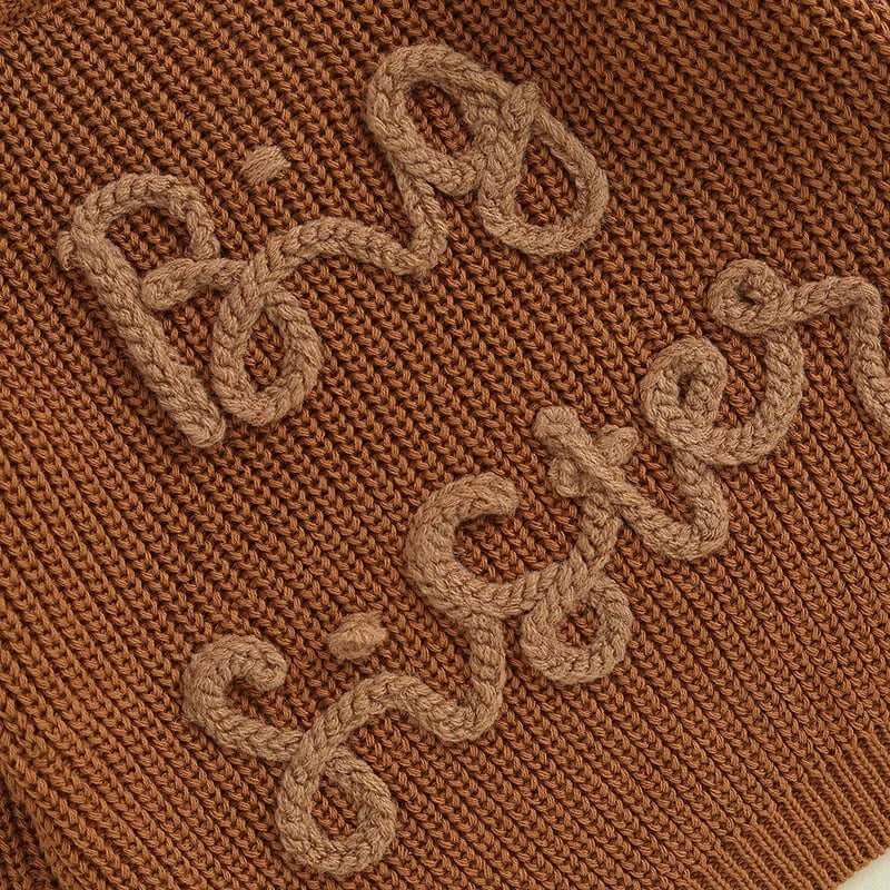 Big Sister Jumper in chocolate brown showing closeup of embroidery