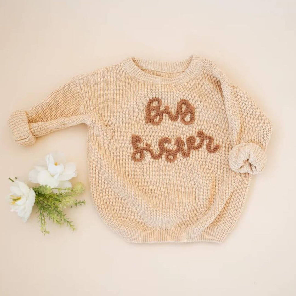 Big Sister Jumper in beige for girls 1-5 years styled flat lay