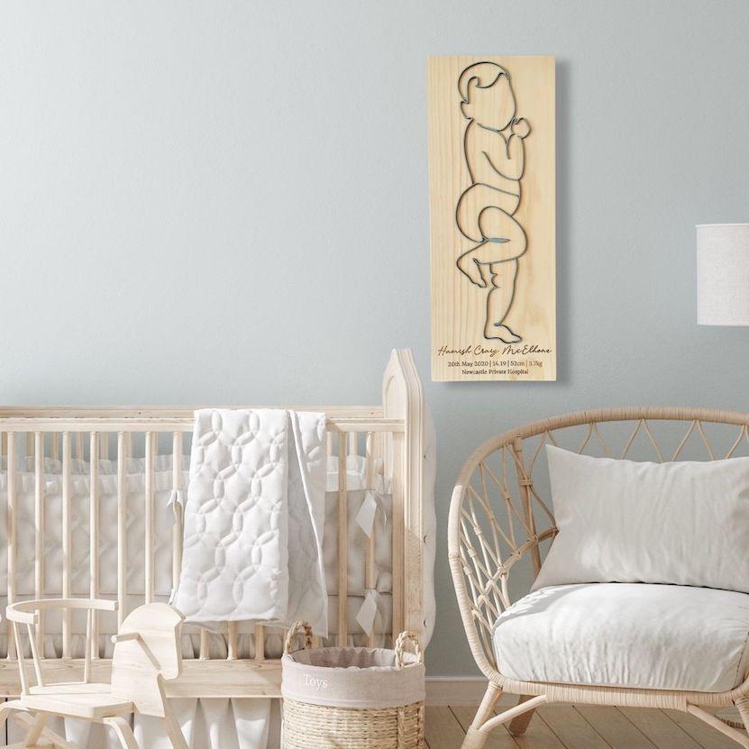 Personalised baby outline birth plaque with 3D design, engraved details, and wood finish, perfect keepsake for newborn memories.