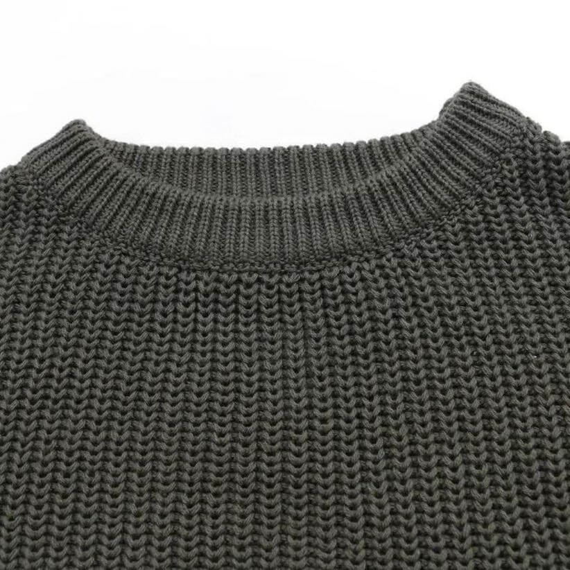 Closeup of baby jumper in charcoal
