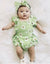 Daisy Ruffle Romper in green | Pastel Floral Baby Girl Outfit - Lulu Babe