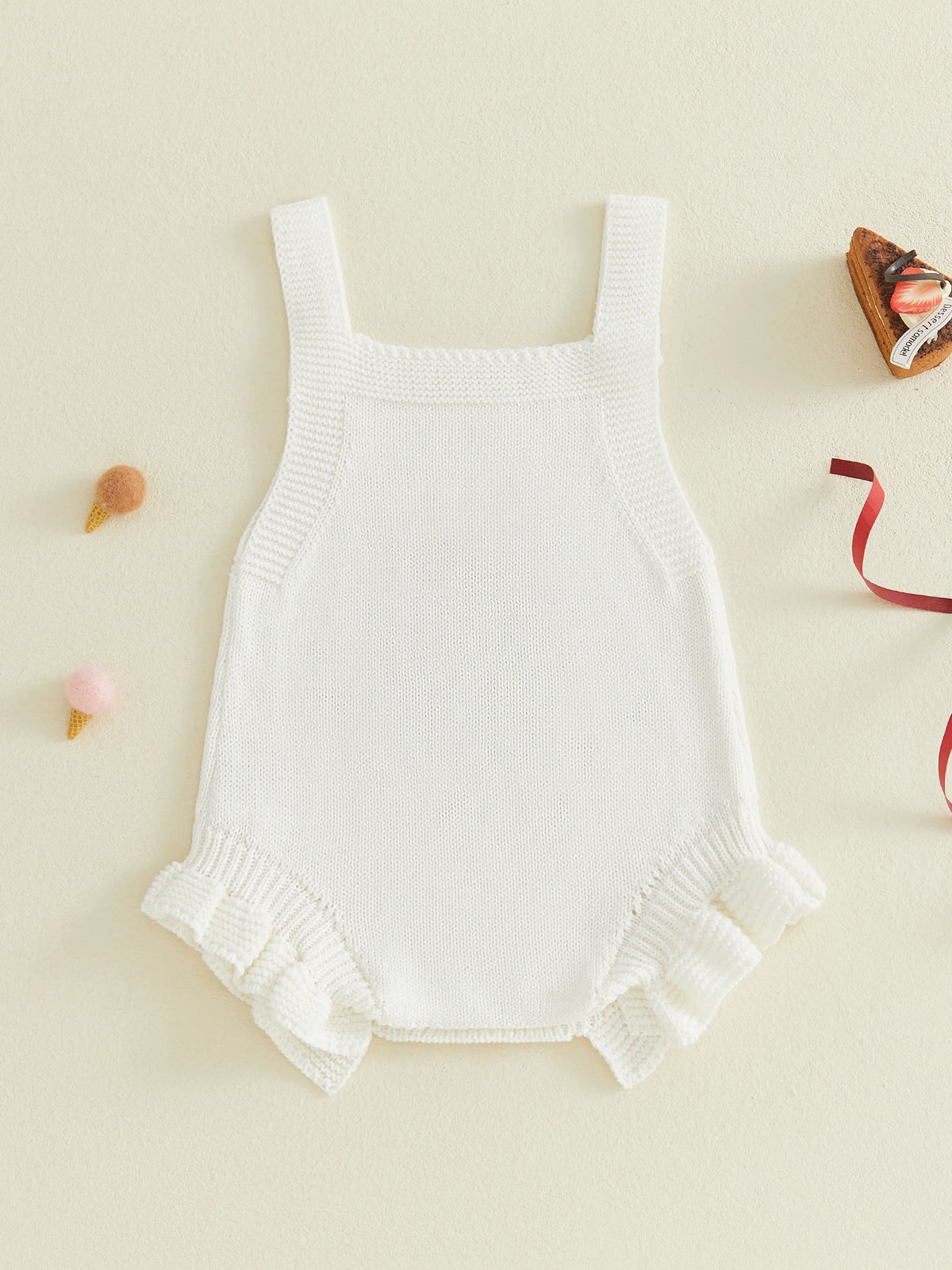 Back view of baby girl first birthday romper in white