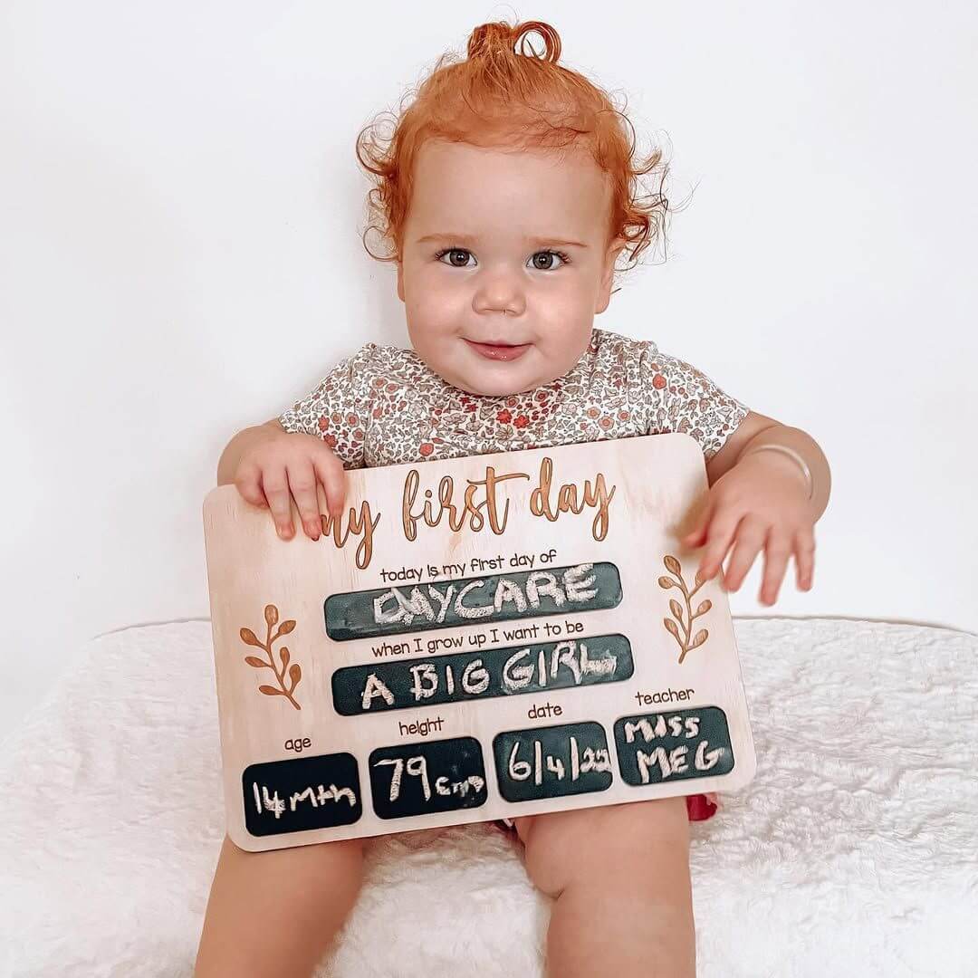 Girl holding First Day of School Wooden Board