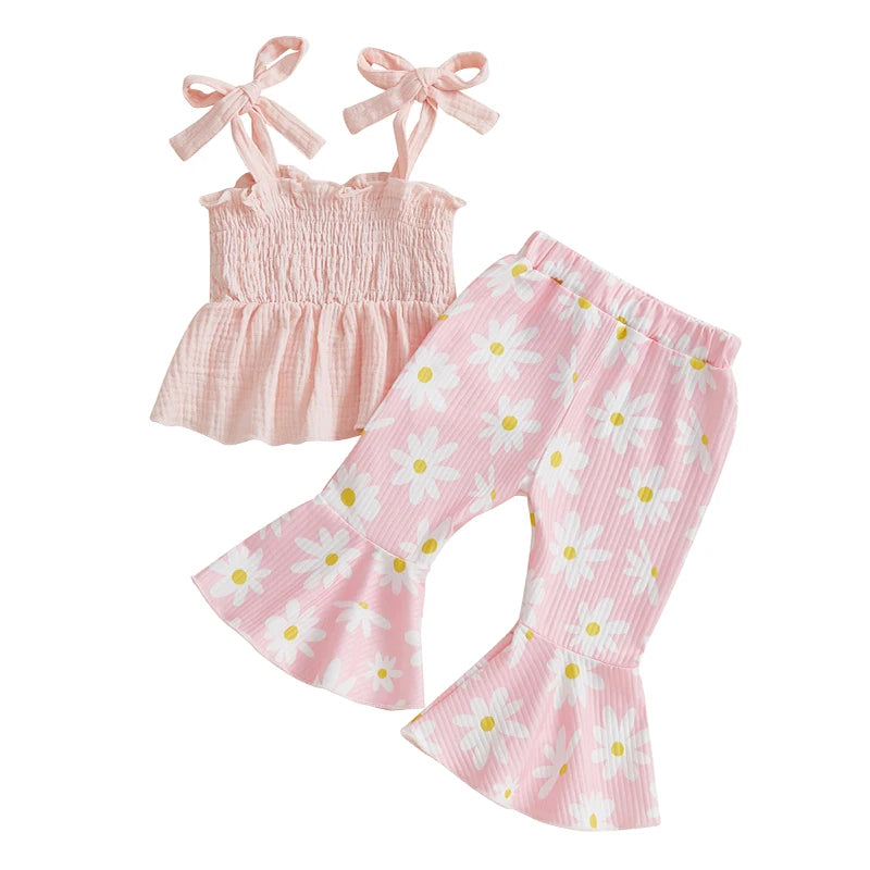 Vivian Floral Flare Baby Girl Set featuring a shirred pink top and matching flared pants with playful daisy print, perfect for spring.